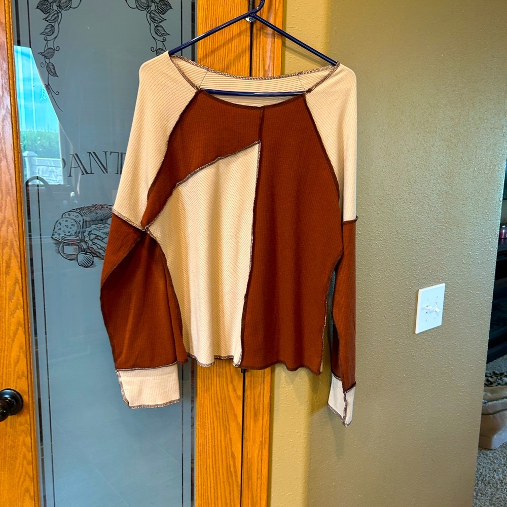 Long sleeve stitched boutique shirt.
